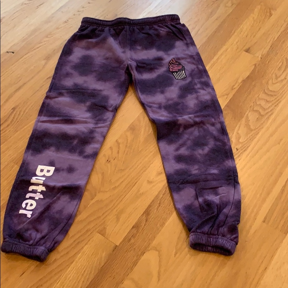 tie dye purple sweats with a cupcake